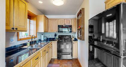 Lakefront, dog-friendly home with private dock, swimming beach & firepit