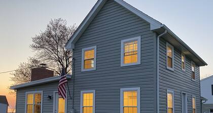 Single family home with screened porch.