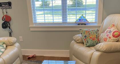 Single family home with screened porch.