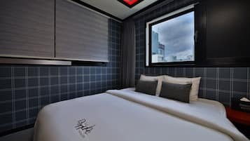 Habitación Deluxe con 2 camas individuales | Insonorización, wifi gratis y ropa de cama