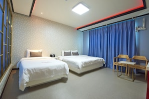 Habitación Deluxe con 2 camas individuales | Sistema de insonorización, wifi gratis, ropa de cama