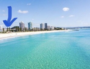 On the beach, sun loungers, beach towels