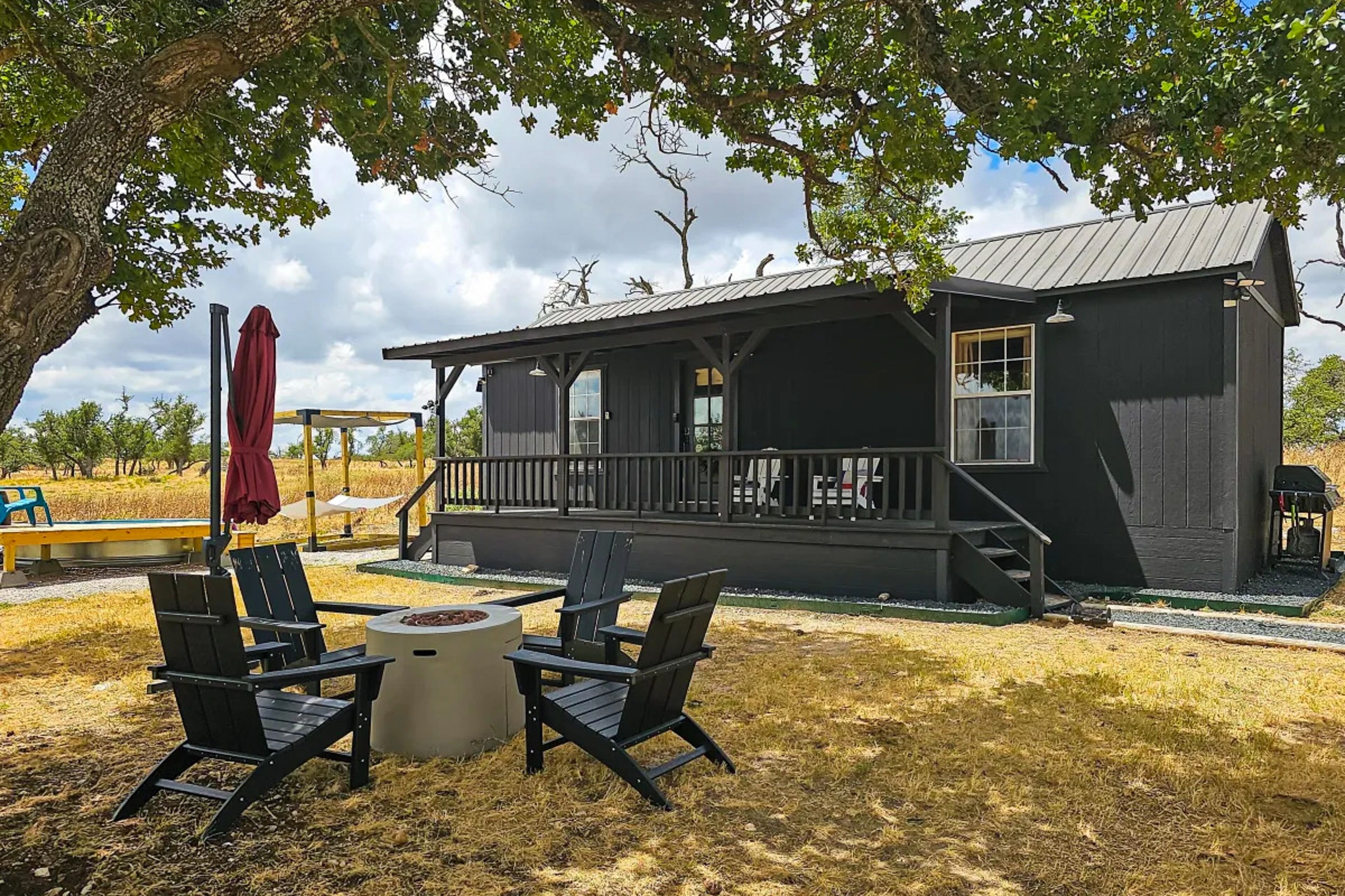 Texas Hill Country cabin with stock tank pool & porch with amazing views