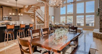 Lodge-style home with striking mountain views, fireplaces, & hot tub