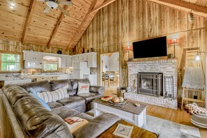 TV, fireplace, books - Two-Story, Dog-Friendly Home w/ Private Hot Tub, Fast WiFi, & Mountain Views (Blairsville)