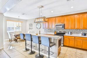 Fridge, microwave, oven, stovetop - Dog-Friendly Home w/ Private Hot Tub, High-Speed WiFi, AC, Washer/Dryer & Patio (Davenport)