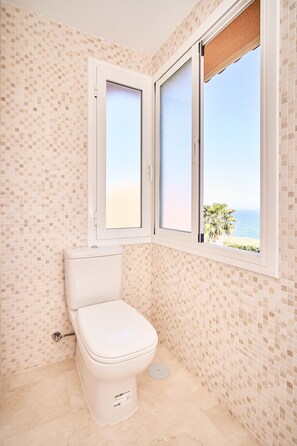 Bathtub, hair dryer, towels