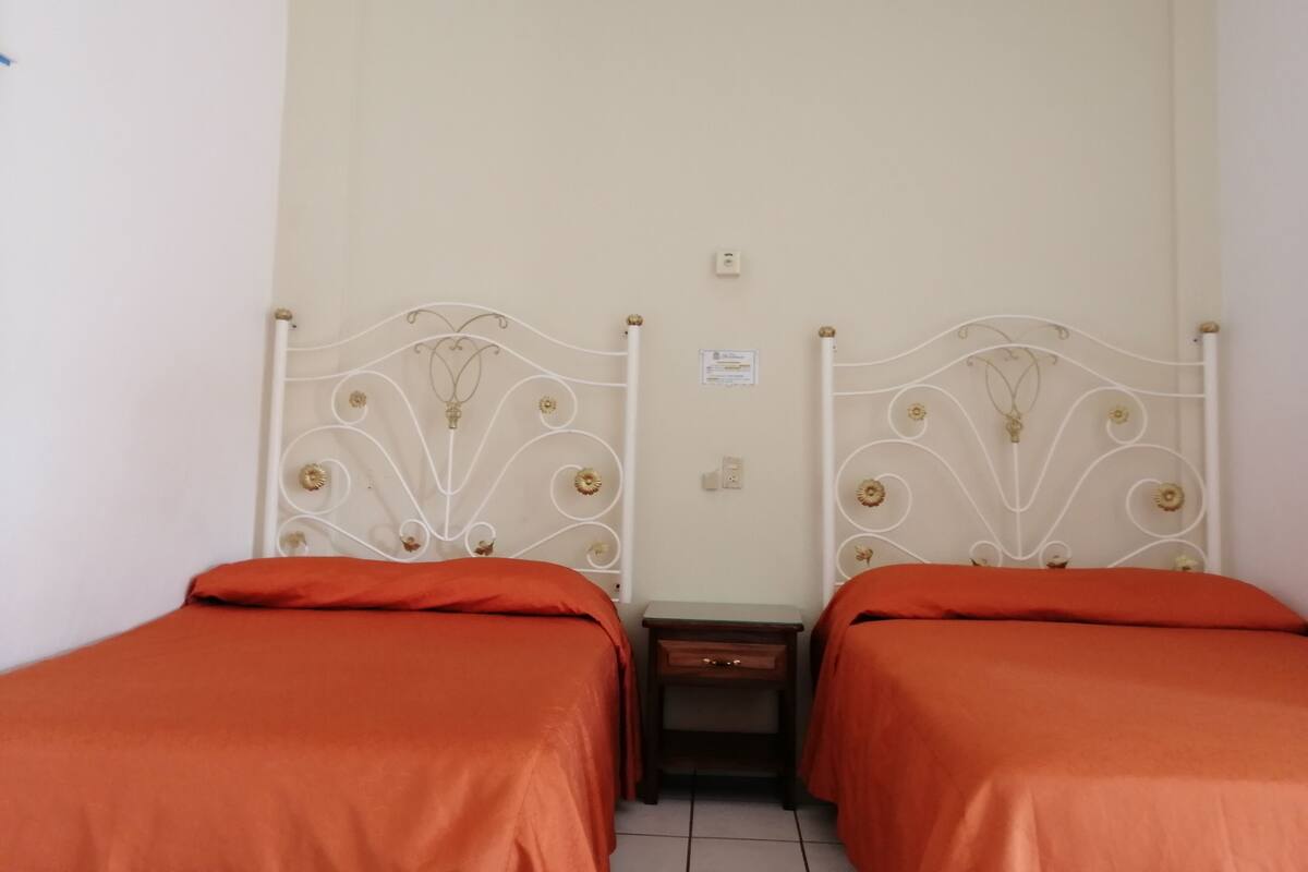 Standard Room, 2 Double Beds | Iron/ironing board, free WiFi, bed sheets