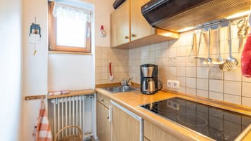 Fridge, coffee/tea maker, electric kettle, toaster