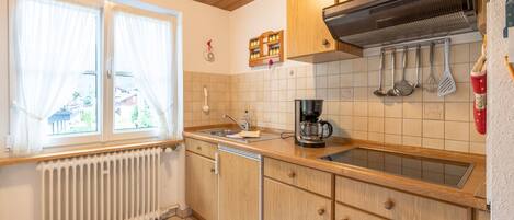 Fridge, coffee/tea maker, electric kettle, toaster