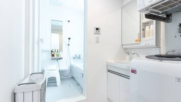 Grandioso Okinawa Pool Villa Onna 9B | Bathroom | Separate tub and shower, deep soaking tub, hair dryer, slippers