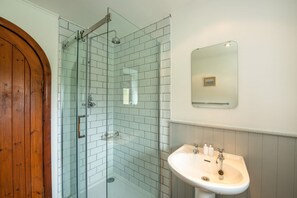 Bathtub, hair dryer, towels, soap