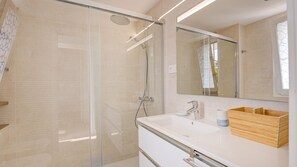 Hair dryer, bidet, towels, soap