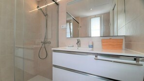 Hair dryer, bidet, towels, soap