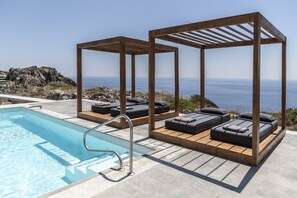 Outdoor pool, an infinity pool, sun loungers - Pristine Seaview Villa , with 5-Star Resort Access (Faliraki)