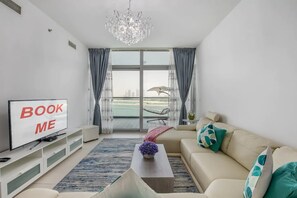 Apartment (1 Bedroom) | Living area | 0-cm plasma TV with cable channels, TV - Stunning 1 Bedroom Sea View on the Palm (Dubai)