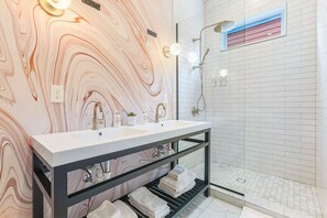 Bathtub, hair dryer, shampoo
