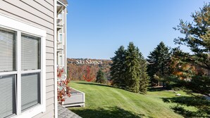 A house with a view of ski slopes. - Prime Resort Location, Modern Ski/Out w/ Balcony (Champion)