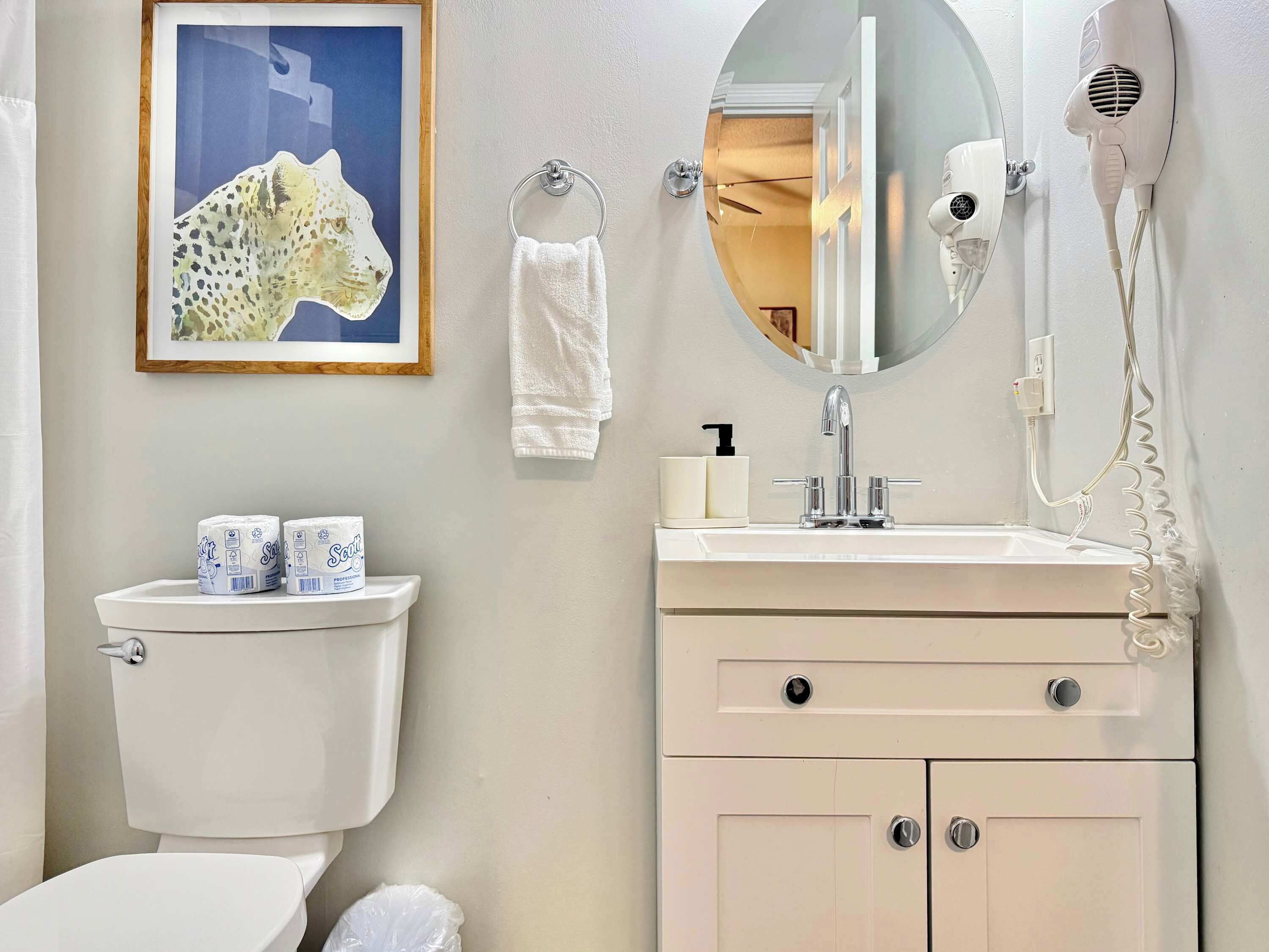 Bathtub, hair dryer, towels