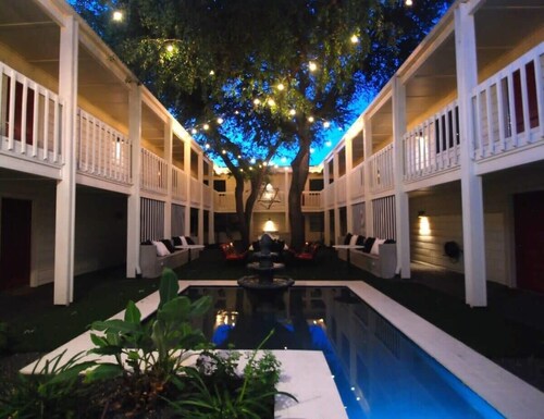 Central 2BR king suite with pool and gym