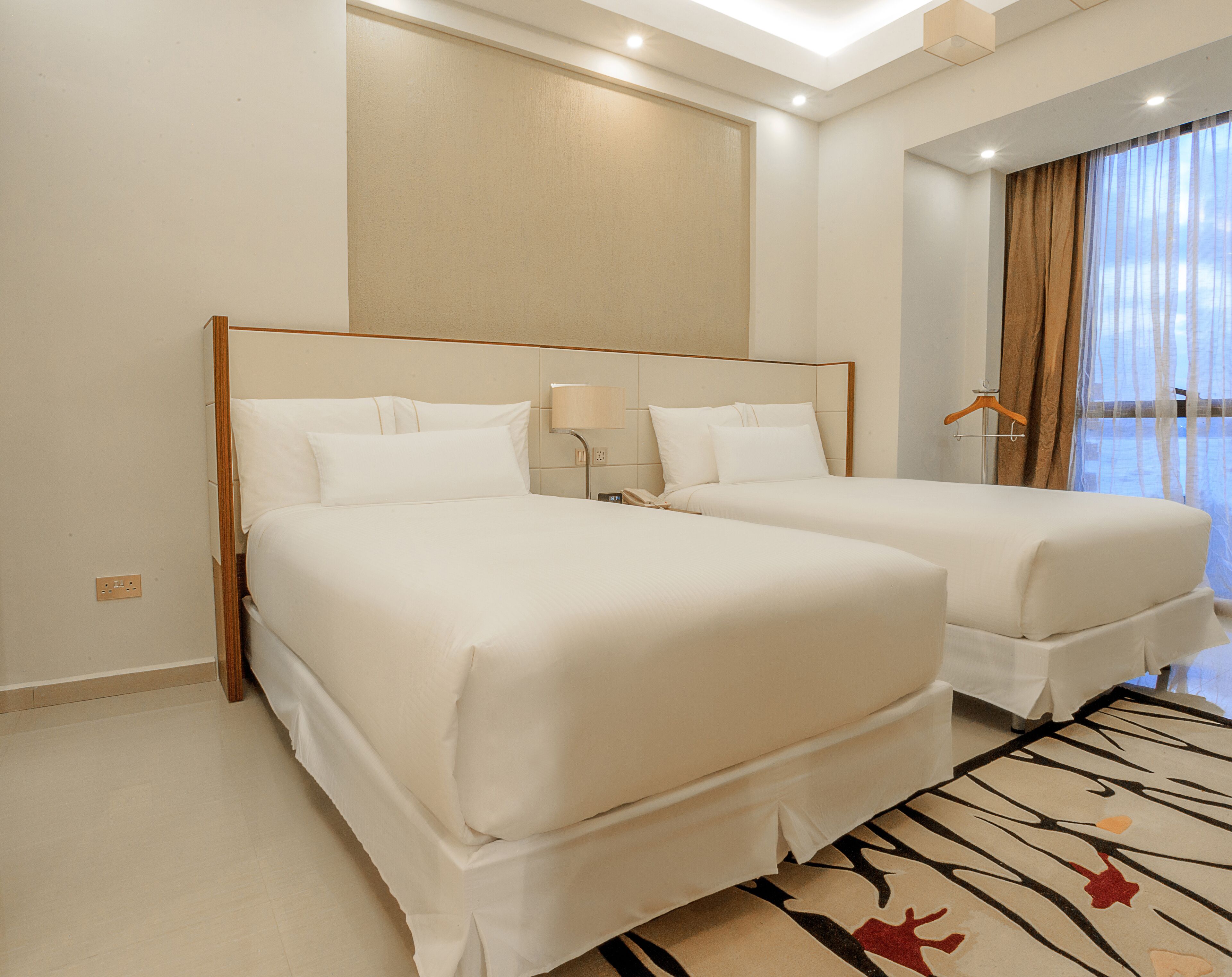 premier studio, 2 queen beds, ocean view | minibar, in-room safe, blackout curtains, soundproofing