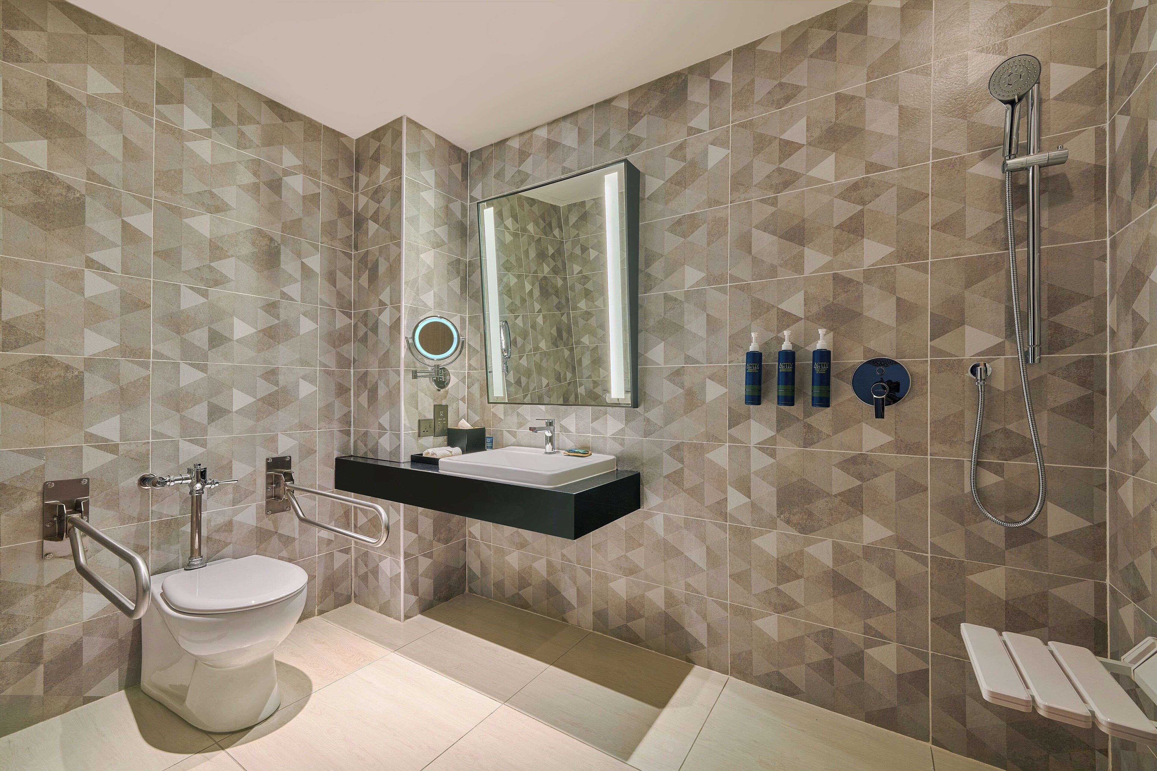 deluxe room, 1 king bed, balcony | bathroom | shower, rainfall showerhead, free toiletries, hair dryer