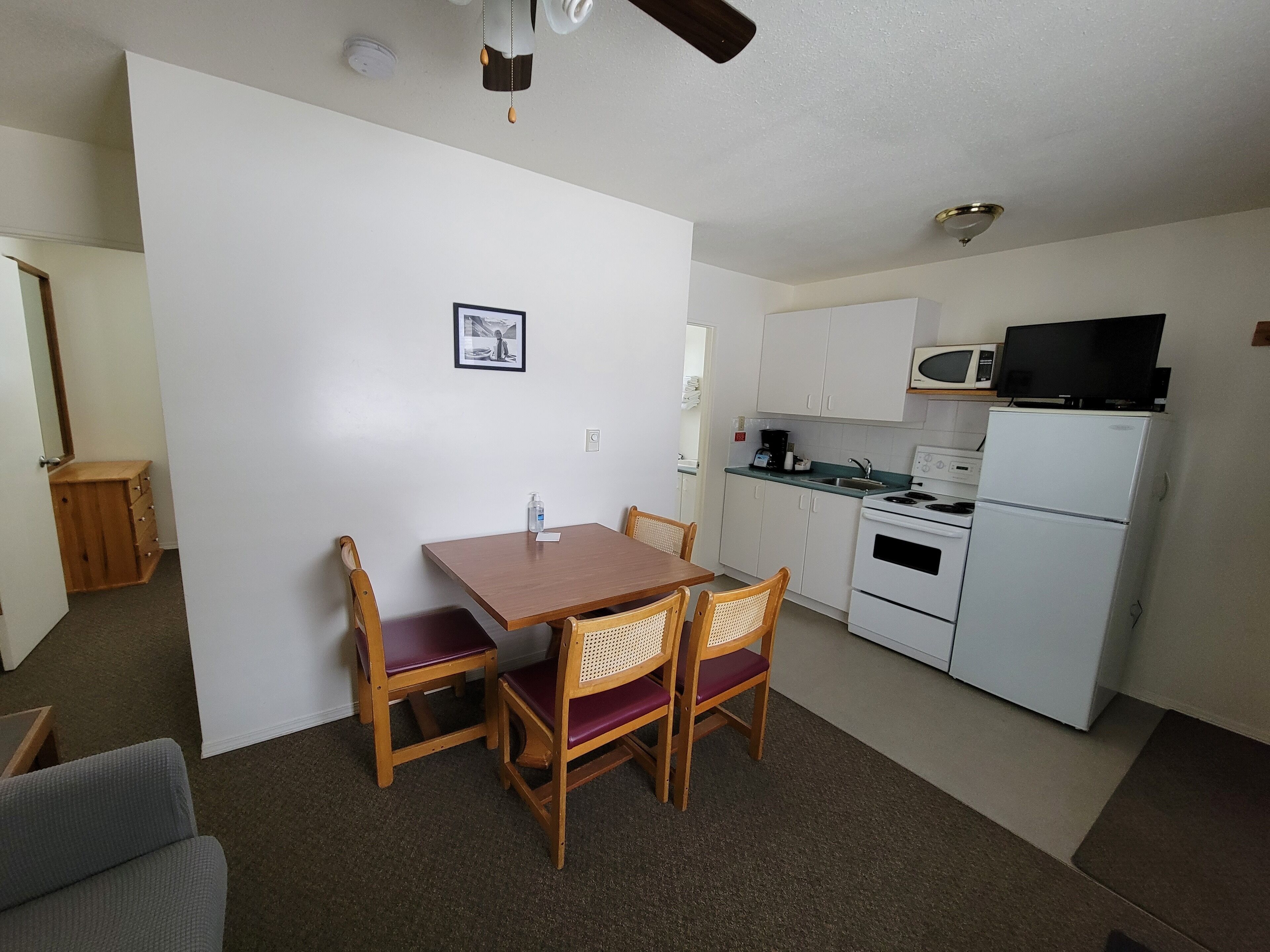 Family Room, 2 Bedrooms | Living area | 25-inch flat-screen TV with cable channels, TV