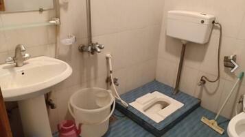 Standard Double Room | Bathroom | Shower, free toiletries, slippers, towels