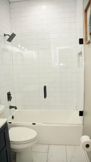 Combined shower/tub, hair dryer, towels, toilet paper - A CABIN IN THE CITY~5 STAR LUSH BACKYARD (Atlanta)
