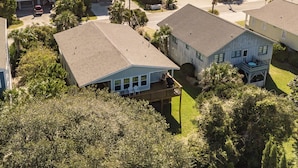 A coastal residential area with houses, a beach, and a clear view of the ocean. - Ocean Breeze - Near Ocean, 5 Bedrooms, Litchfield (Litchfield)
