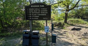 Explore Roadside Park, where you can walk your leashed dog and enjoy the natural surroundings.