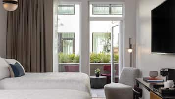 Egyptian cotton sheets, premium bedding, down comforters, in-room safe
