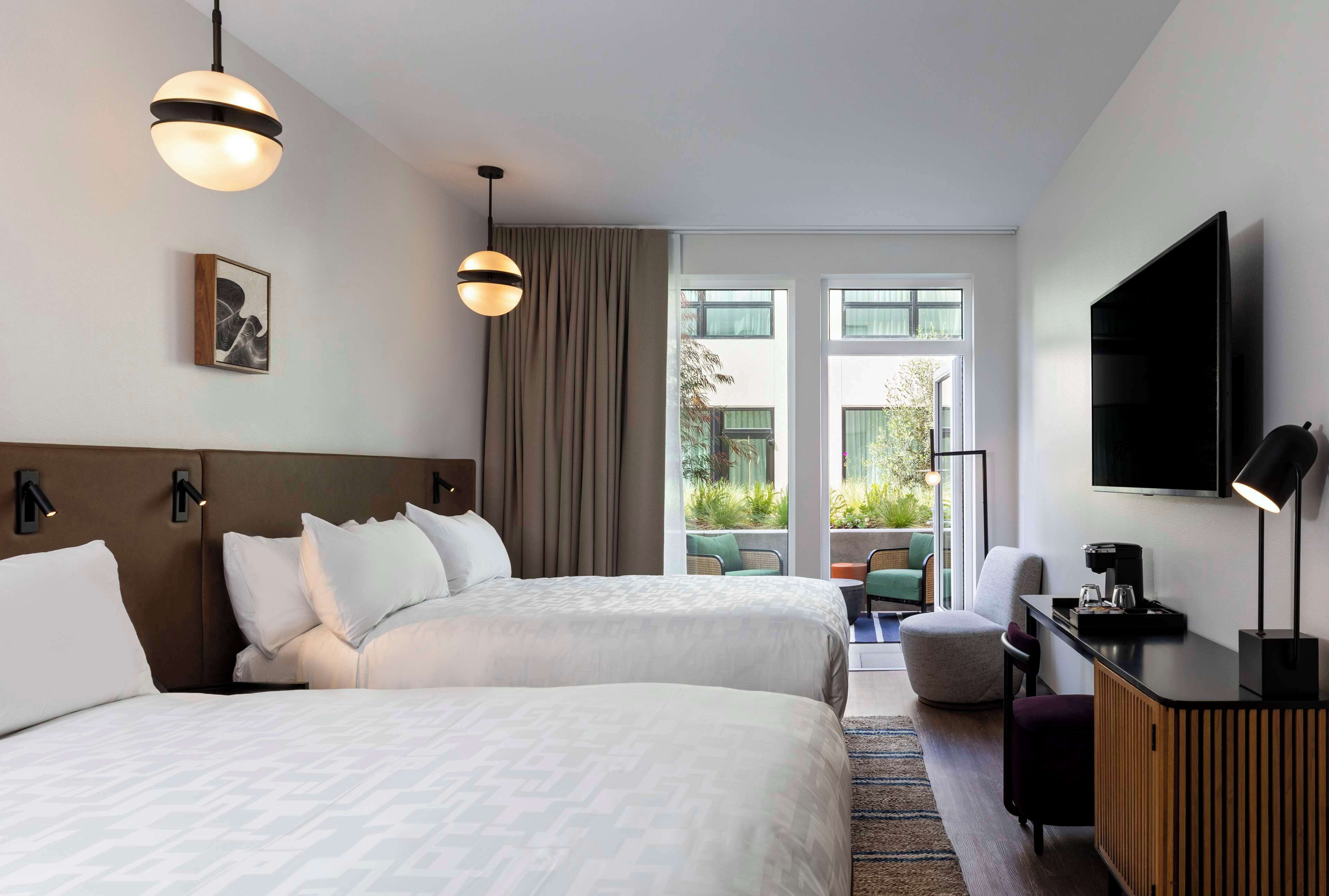 Egyptian cotton sheets, premium bedding, down duvets, in-room safe