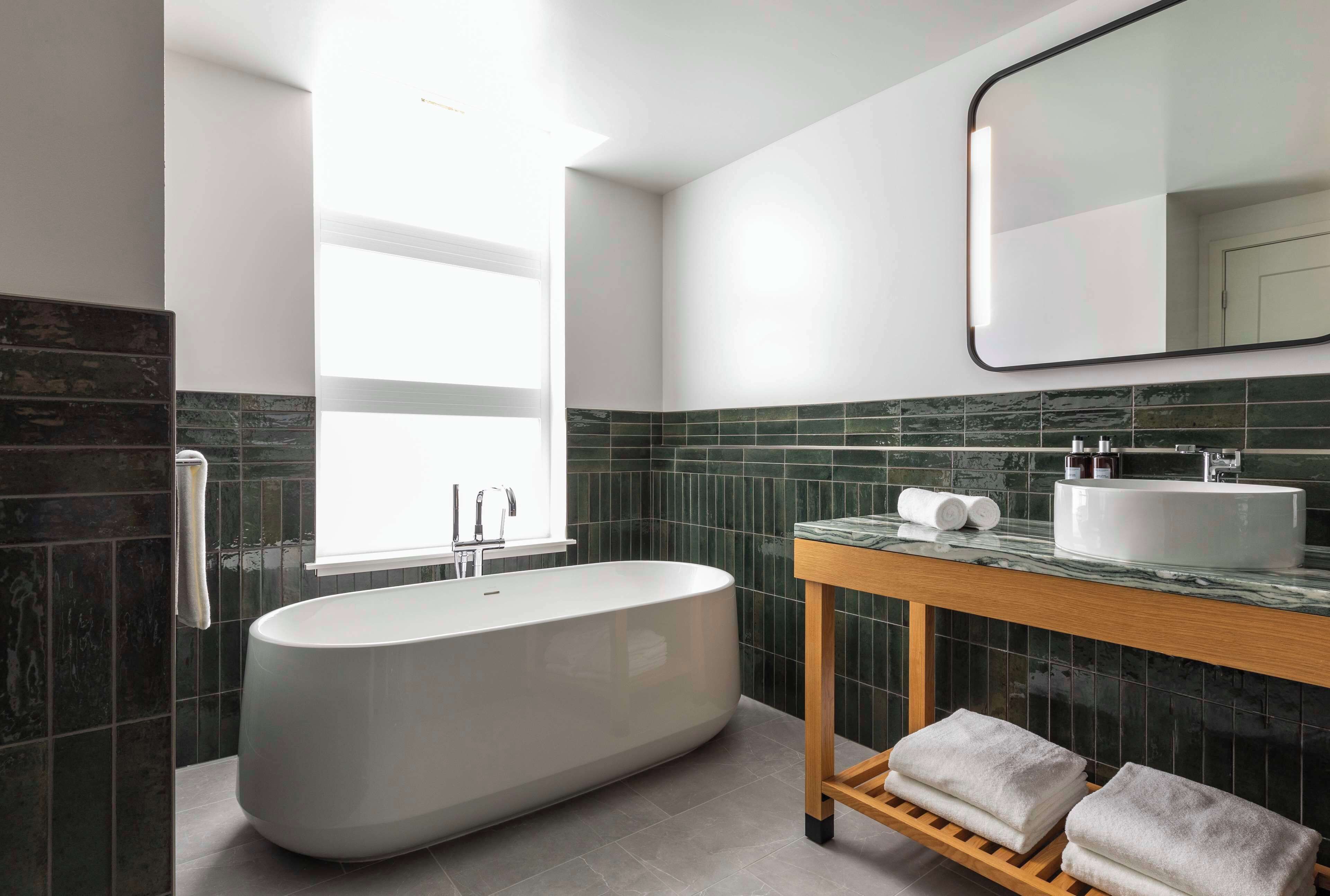 suite (broadway suite) | bathroom | free toiletries, hair dryer, bathrobes, slippers