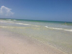 On the beach, sun-loungers, beach towels
