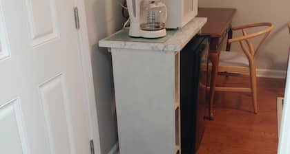 Cozy bedroom with private bathroom, and separate, direct access entrance.