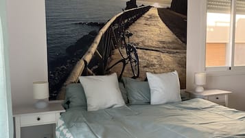 1 habitación, tabla de planchar con plancha, wifi gratis y ropa de cama