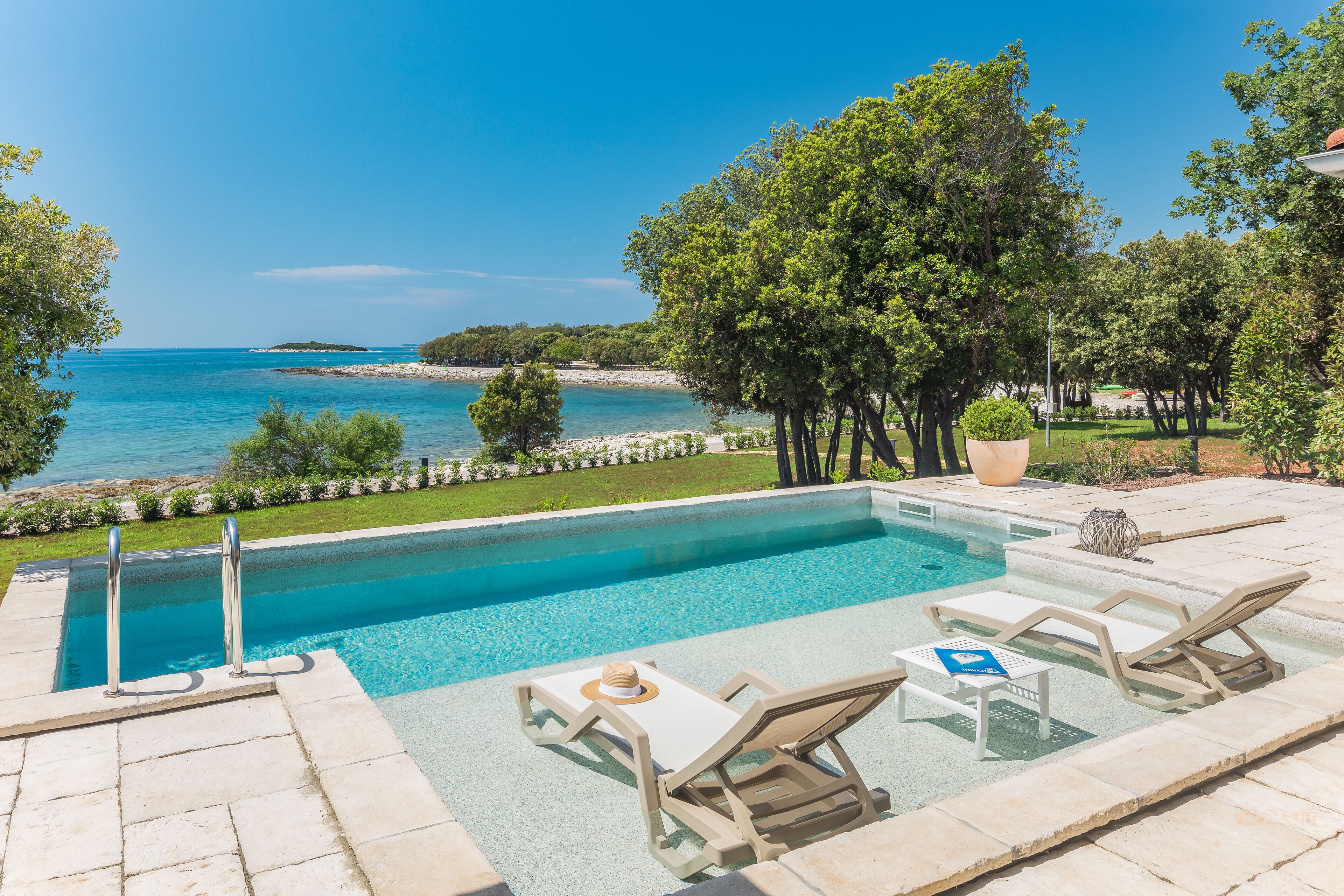 Outdoor pool, pool umbrellas, pool loungers