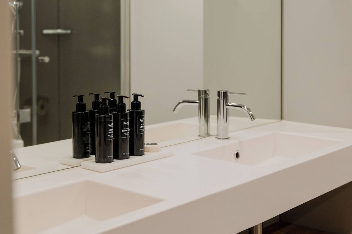 superior double room, bathtub | bathroom | shower, rainfall showerhead, eco-friendly toiletries, hair dryer