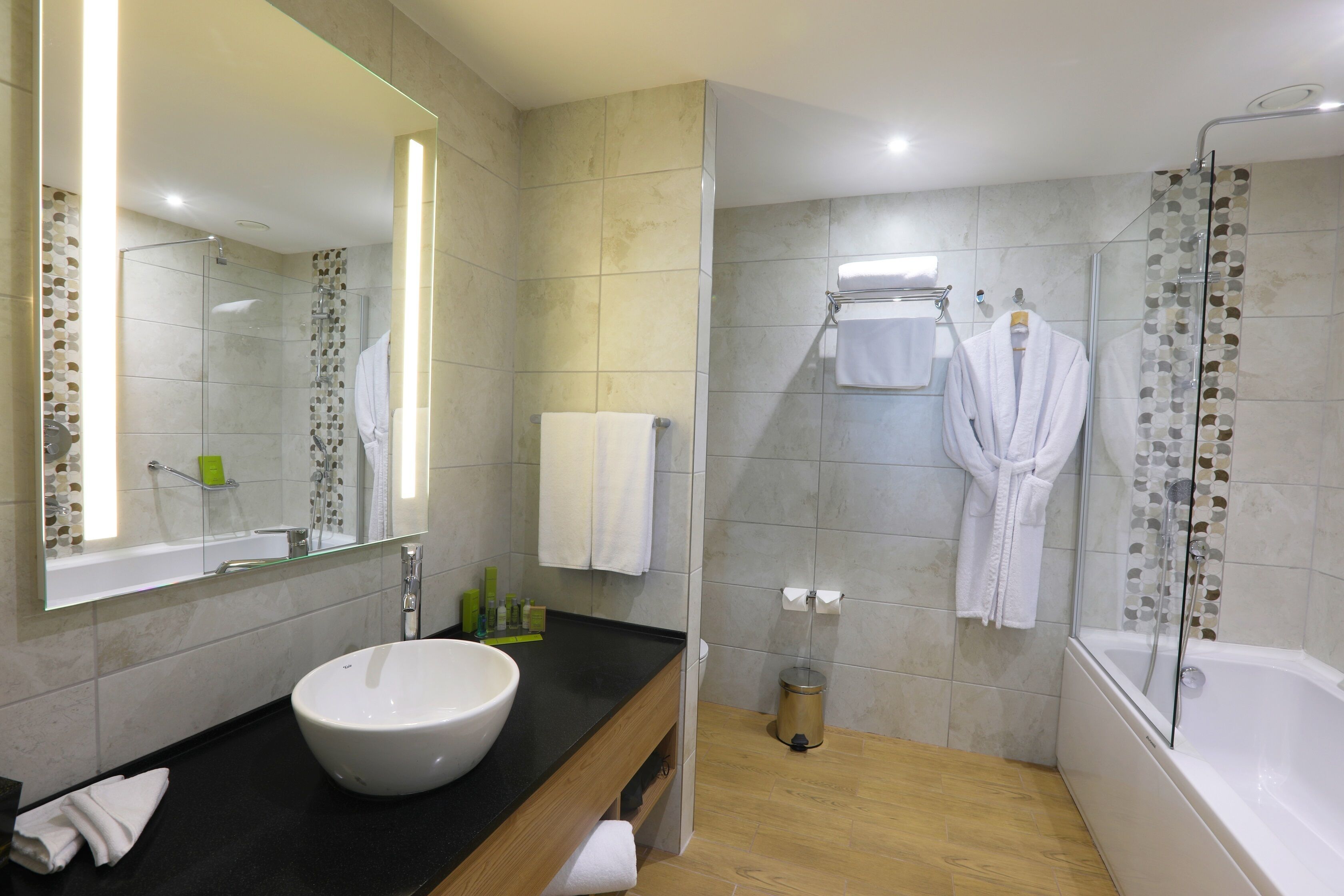 shower, rainfall showerhead, hair dryer, towels