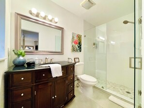 Shower, hair dryer, towels, soap