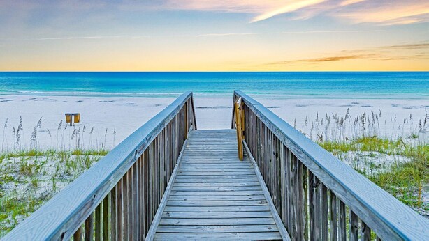 A wooden boardwalk leading to a beach with a clear view of the ocean. - Gulf-Front Pool | Foosball | Elevator (Miramar Beach)