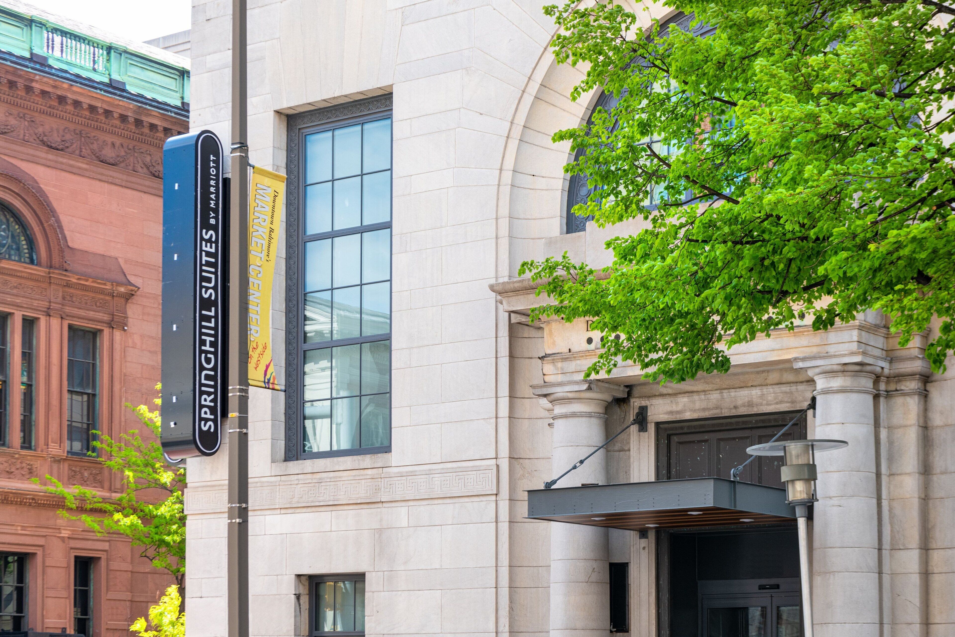 A building with a sign for SpringHill Suites by Marriott.