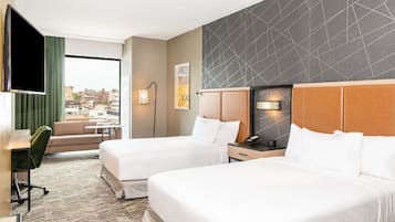 Desk, laptop workspace, iron/ironing board, free cots/infant beds