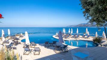 2 outdoor pools, pool umbrellas, sun loungers