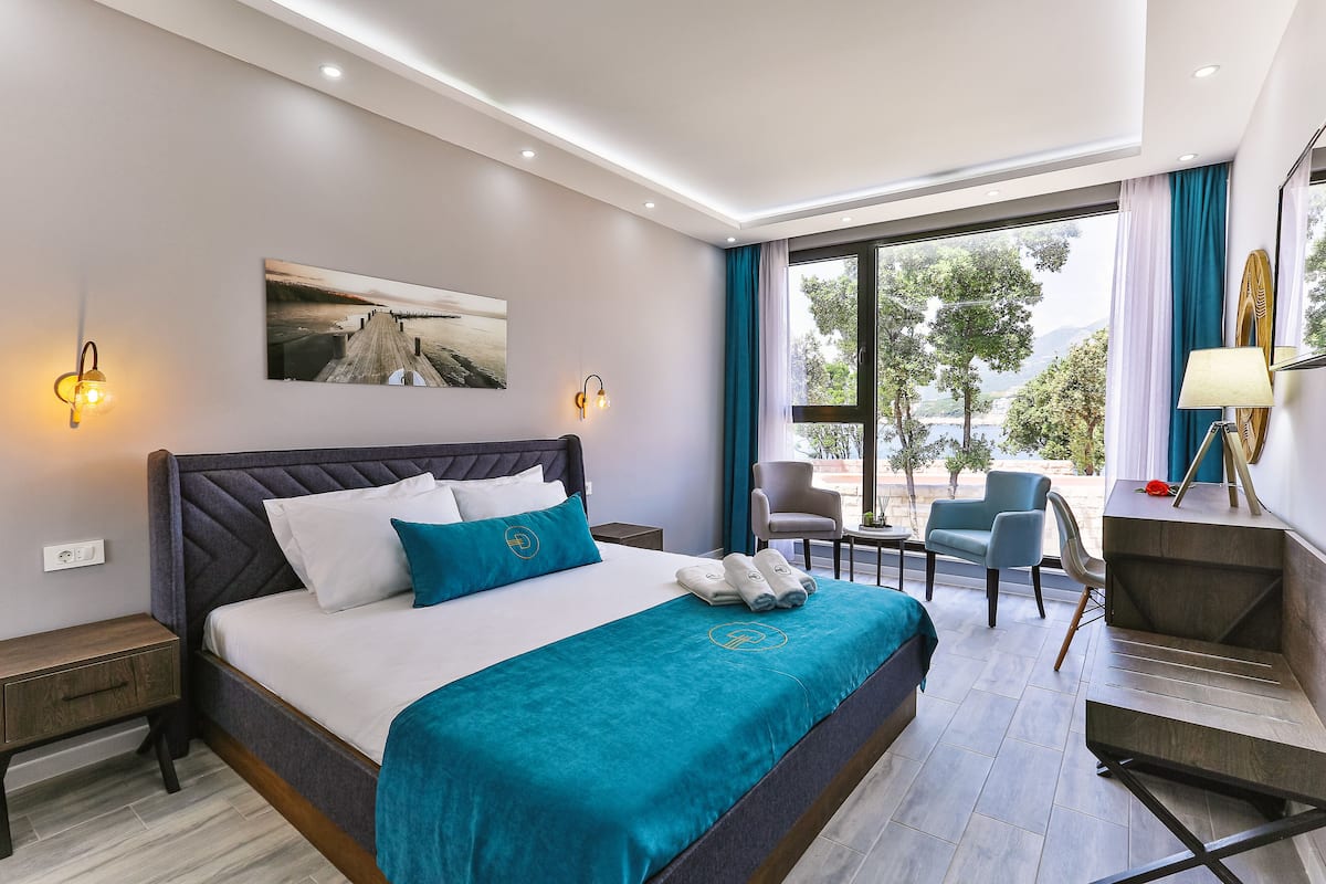 Deluxe kamer | Uitzicht op strand/zee