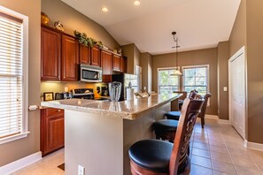 Fridge, microwave, dishwasher, cookware/dishes/utensils