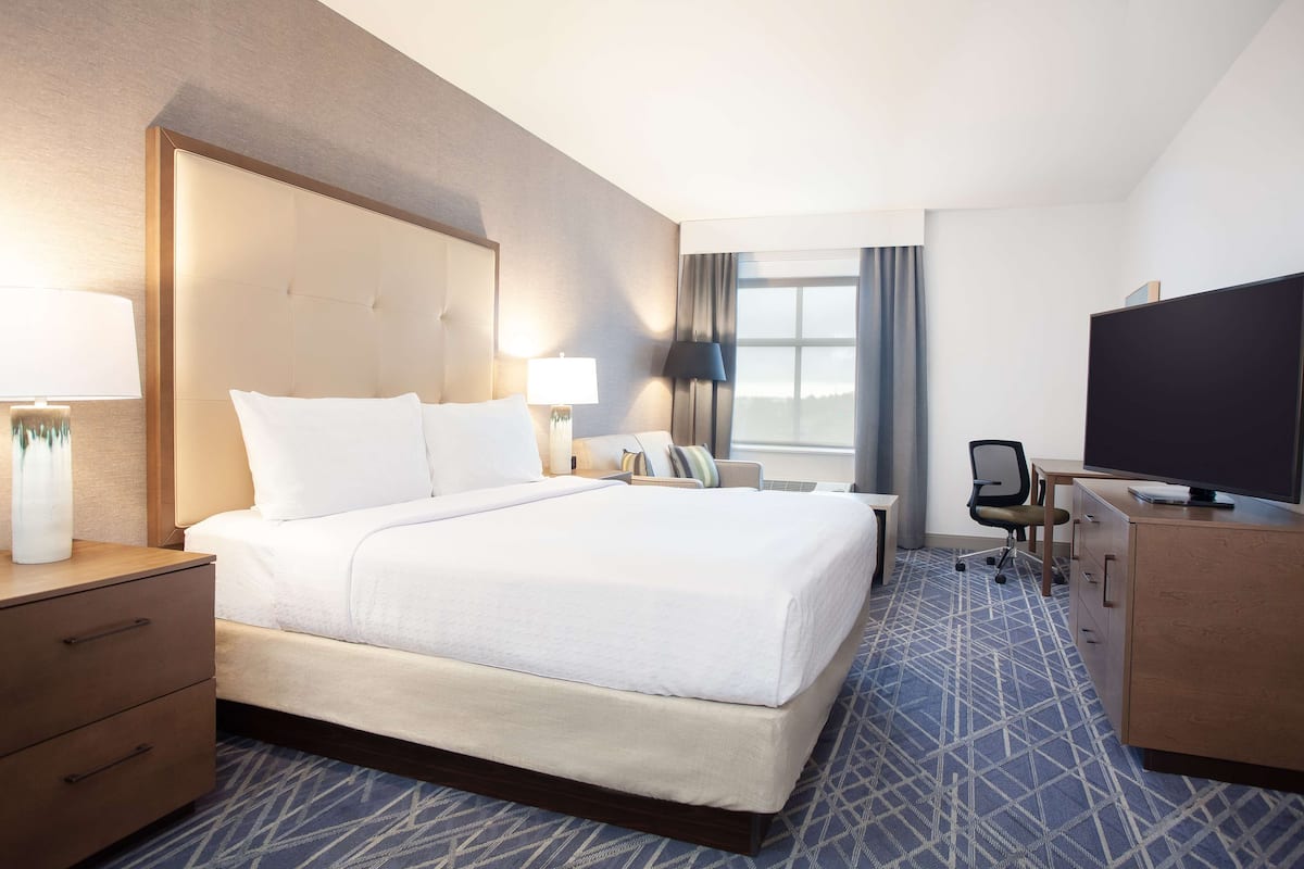 desk, blackout curtains, iron/ironing board, free cots/infant beds