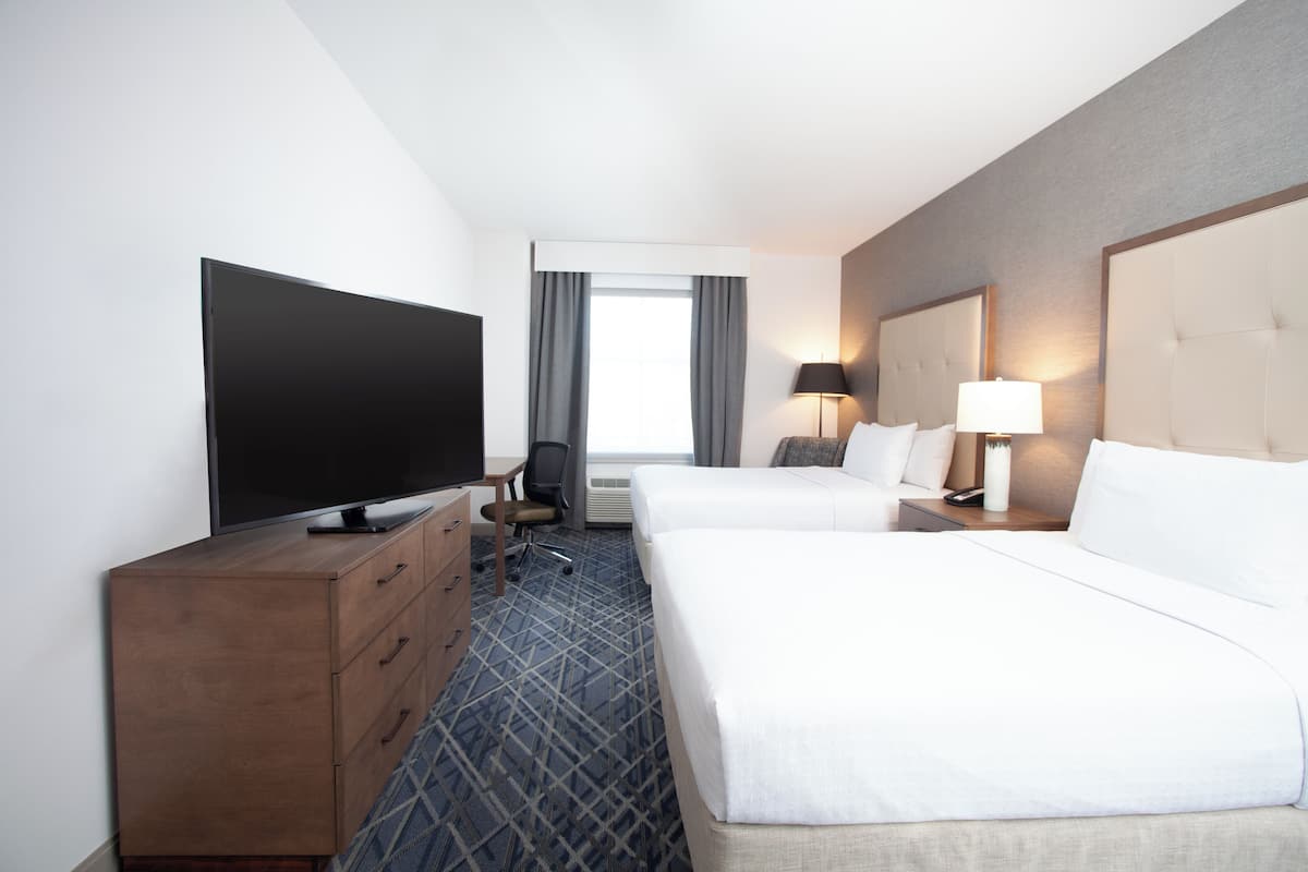 Suite, 2 Queen Beds, Accessible, Bathtub (Mobility) | Desk, blackout curtains, iron/ironing board, free cots/infant beds