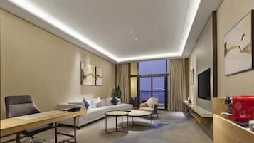 Premium Suite, 1 King Bed | In-room safe, desk, soundproofing, iron/ironing board